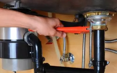 Welke zones en afstanden gelden voor elektra in badkamers volgens NEN 1010?